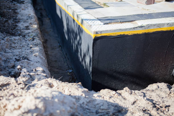 Professional Waterproofing technician working in Libertyville, IL
